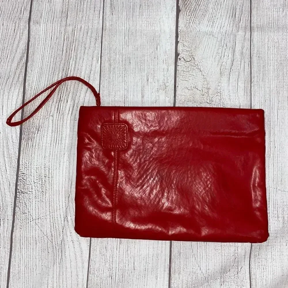 Clutch purse with wrist strap, zipper closure red